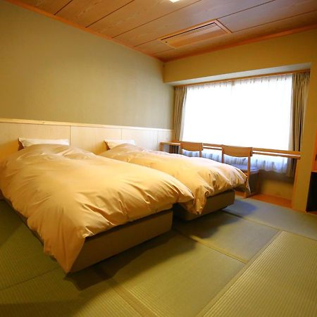 Nakajimaya Ryokan Нодзава Онсен Екстериор снимка