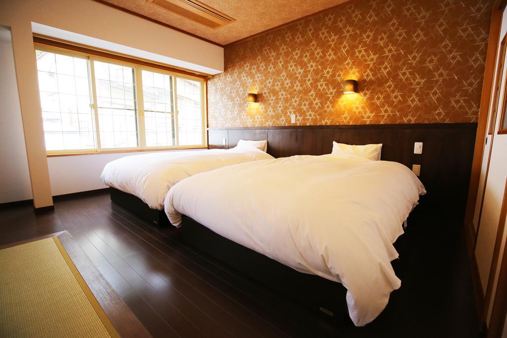 Nakajimaya Ryokan Нодзава Онсен Екстериор снимка